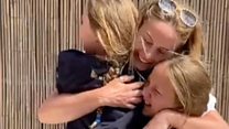 Health worker reunited with girls after nine weeks