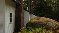 Cabins are sympathetically built around rocks