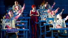 Emma Bell as Tina with the Chorus of the Royal Opera House