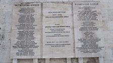 A carved stone tablet at the Berlin stadium lists 1936 medal winners - there remains a dispute over marathon winner Son Ki Jung