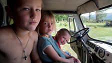 Nine-year old Timka Manoshkin with his sister Vasilisa and brother Slava