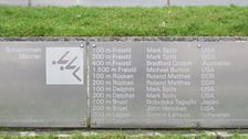 The wall listing the 1972 Olympic winners in each event