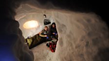 Drinking tea in a snow hole