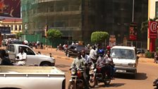 Passengers on the 'boda-boda' or motorbike taxis in central Kampala