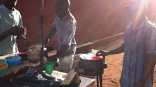 Making 'rolex' on the streets of Jinja in Uganda.