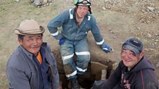 Mongolian gold miner Sukhbaatar and his 24 year old son-in-law Amga show Craig Notman from the UK to the Uyanga mine site.