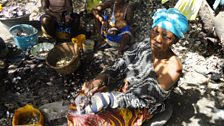 Oyster preparation in Gambian village