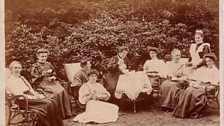 An Edwardian family having tea in the garden