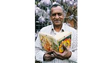 Sonny Venkatrathnam with his copy of the Complete Works of Shakespeare