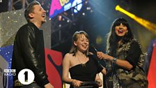 Chelsea receives her Teen Hero award from Professor Green and Jameela Jamil