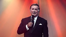 Sir Terry Wogan introduces the evening's main vocalists