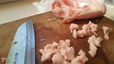 Cutting pork fat