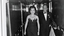 Alistair and Jane Cooke heading out to dinner, aboard the Queen Mary, 1970s