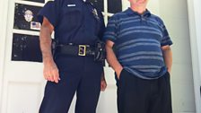 Ian with Police Chief Rick Wilcox outide the old poice station where Officer Obie arrested Arlo.