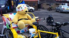 Pudsey in the back of the rickshaw