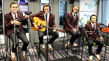 McFly performing an acoustic version of their single "Love Is Easy".