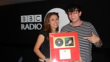 Grimmy presented Gabriella Cilmi with a gold disk... and she's only 16!