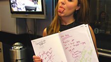 Gabriella signs the show's black book