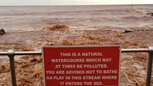 Dawlish - the stream meets the sea