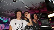 Harry Styles, Example and Grimmy about to begin George Michael karaoke