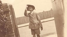 Benjamin Britten standing in the gateway at his home, 21 Kirkley Cliff Road, Lowestoft in the early 1920s.