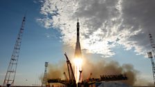 A Soyuz rocket carries 3 Astronauts to the International Space Station. Photo Credit: NASA/Carla Cioff