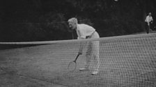 Beveridge playing tennis at Banstead in 1919.