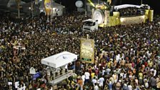 The floats surrounded by millions of carnival-goers