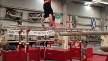 Luke Carson on the parallel bars.