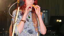 Florence tries out a kazoo