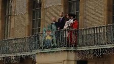 The royal couple on the balcony of Guildhall.