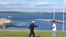 Dev under the watchful eye of Hywel the expert fisherman