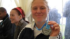 Rachel shows off her medal