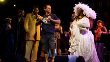 Dave impresses a genuine gospel choir with his rendition of the Funky Chicken in LA's House of Blues