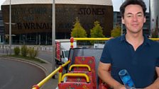 The Wales Millennium Centre is overshadowed by Dave's wind hair