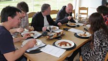 The team enjoy today's lunch - chili cooked by Dave