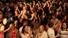 The crowd get on their feet ot dance along to the Golden Hour - can you spot the Alan Titchmarsh lookalike?