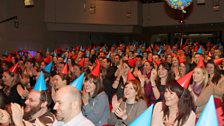 Chris is surprised by 300 fans in the 91ȱ Radio Theatre!