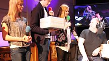 Sara and Greg also bring on a present from Fearne and a cake from Jamie Oliver.