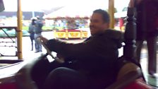 An action shot of Chris on the dodgems