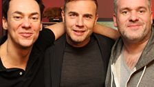 Gary Barlow congratulates Chris and Dave and presents them with their official Guinness certificate.