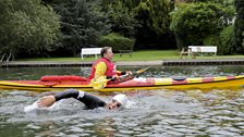 A canoeist keeps an eye on David