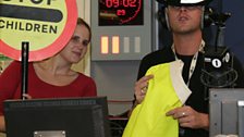 Scott and Beccy get the Lollipop lady outfit ready