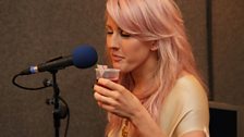 She tries one of Beccy's cocktails - basically just cranberry juice!