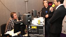 Robbie and Jason from Take That pop into Scott's makeshift studio