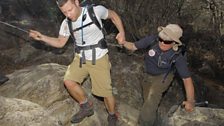 Dermot O'Leary gives Peter White, who is blind, a guiding hand