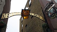 Above the entrance to The George Inn