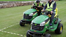 It's a nail-biting dash to the finish line as Dave beats Greg in the Lawnmower Racing final!