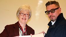 Huey meets with Jean Ashton from The New York Historical Society to view an original poem manuscript