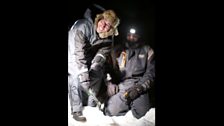 Chipping away at ice in the middle of a lake might not be his best idea